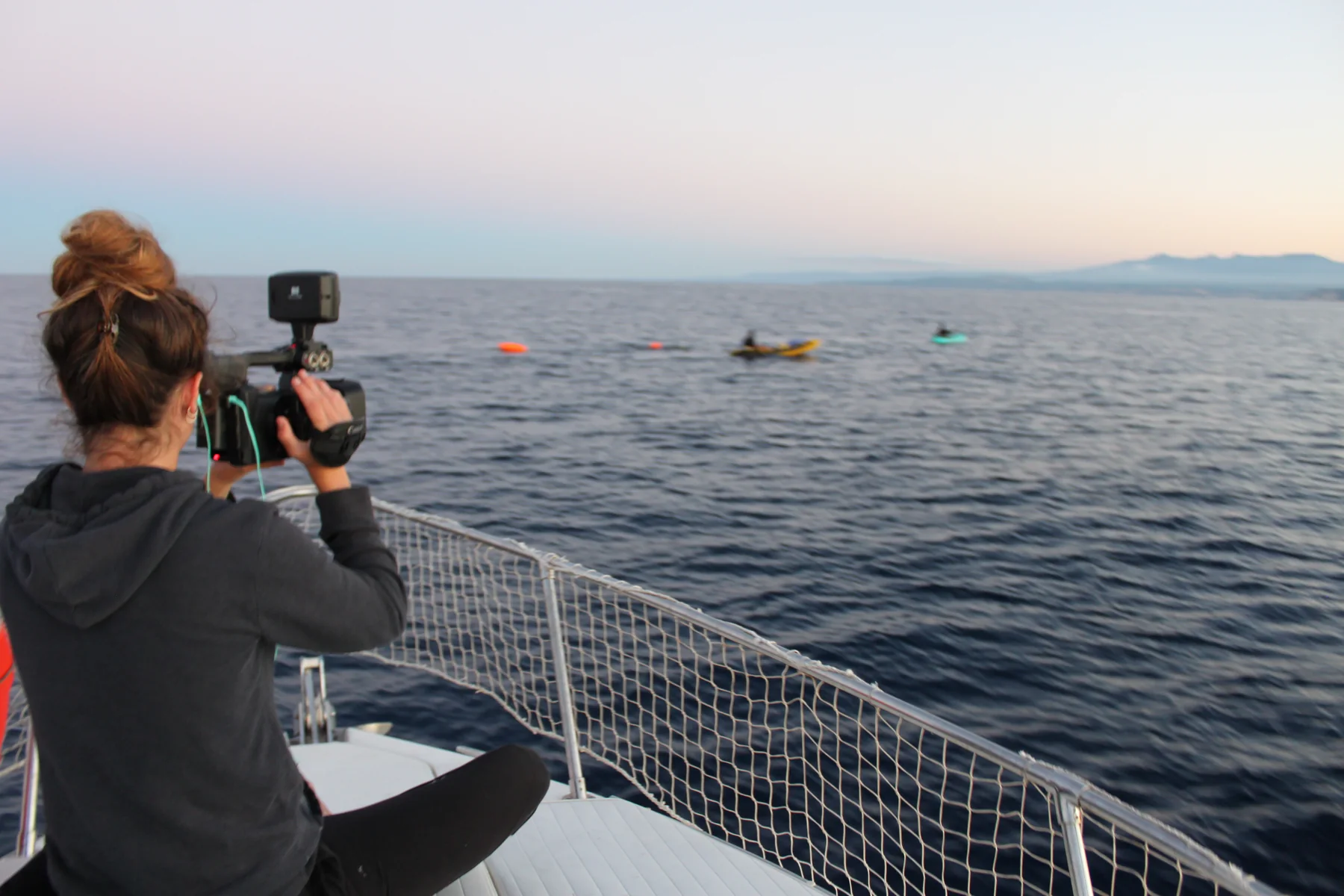 Suivi bateau pendant la traversée à la nage